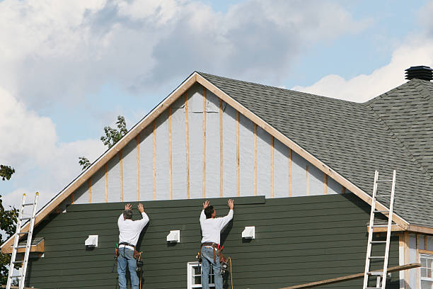 Professional Siding Installation technician working in Liberty, TX